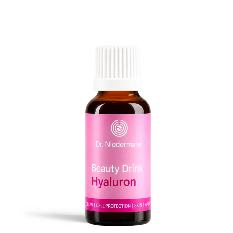Brown glass bottle with white cap and pink label reading 'Dr. Niedermayer Beauty Drink Hyaluron' on a white background.