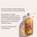 Testimonial_Regulatjpg | Performance Nutrition Schweiz Dr Niedermayer seit über 85 Jahren patentierte Kaskadenfermentation natürlicher Rohstoffe Flasche mit Zitronenscheibe Feige und Artischocke in goldenem Getränk